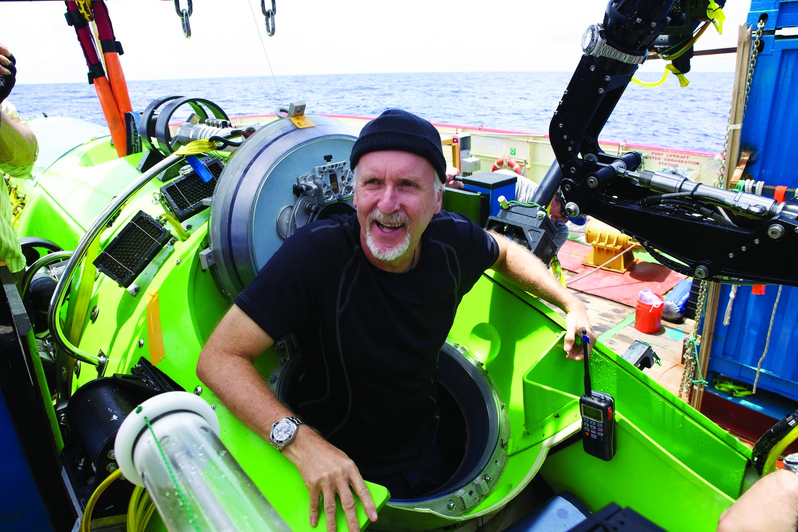 James Cameron emerges from the DEEPSEA CHALLENGER submersible after his successful solo dive to the Mariana Trench, the deepest part of the ocean.