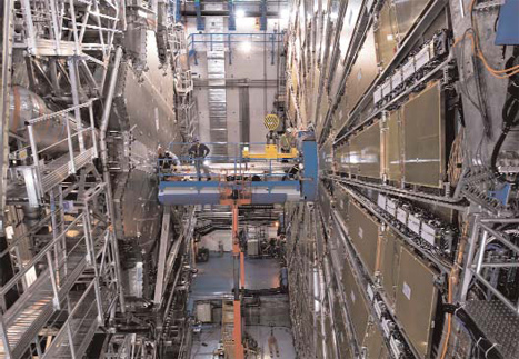 Cox works on the ATLAS detector at the Large Hadron Collider