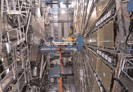 Cox works on the ATLAS detector at the Large Hadron Collider