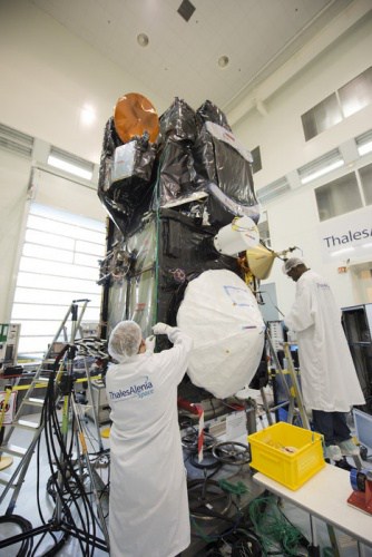 Scientists and engineers work on Sentinel 3A in the cleanroom. 
