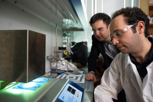 Fabrication of the microchip. The device is fabricated by injecting a polymer into a micro fabricated mold and the polymer is cured under ultraviolet light to produce low-cost, single-use devices.