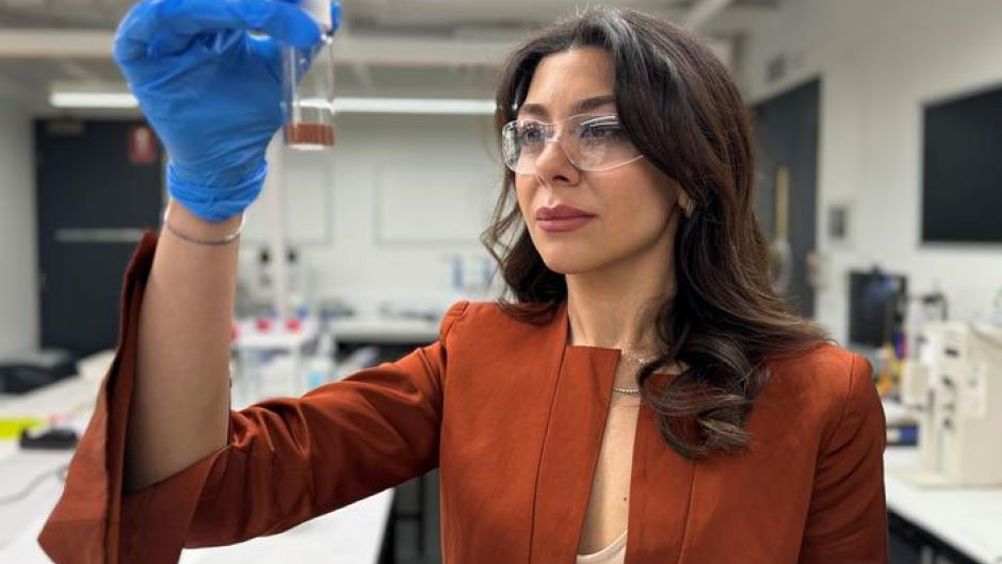 Dr Karma Zuraiqi from RMIT University holds a vial of copper, a key component of the team’s new catalyst