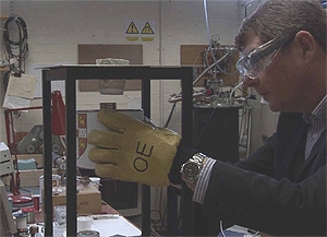 Professor David Cardwell tests a sample superconductor in his lab