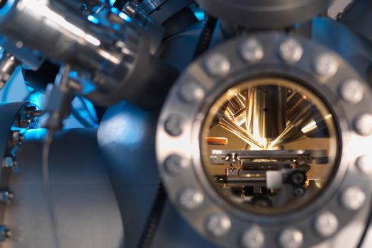 Close-up of the OrbiSIMS instrument’s vacuum chamber showing the nozzles of the ion beams and electrode that extract ionised molecules for analysis 