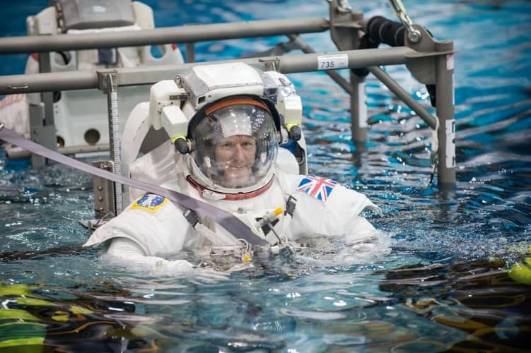 TIm Peake training in the EVA suit for spacewalk in NASA's pool