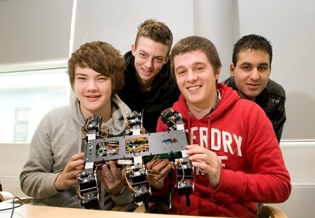 Young engineers show off a robot car they have built. Image courtesy of Diamond Light Source