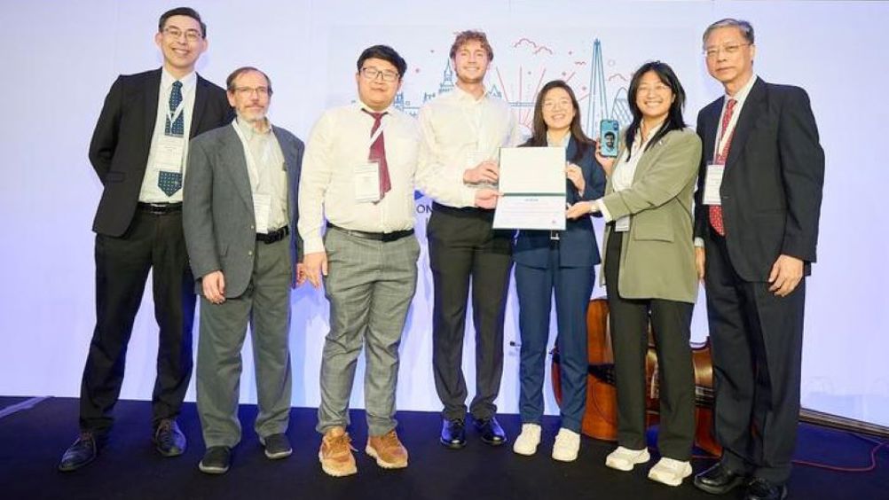 From left to right, Kea-Tiong (Samuel) Tang, IEEE CASS vice president; Joseph Cavallaro; Xinghe (Mark) Chen; Brendan Hlibok; Wendy Tan; Ali Nik-Ahd (on phone); Didi Zhou; and An-Yeu (Andy) Wu, IEEE CASS president-elect