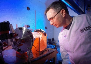 Dr Toby Jenkins uses a plasma reactor to coat the prototype dressings with the antibacterial nanocapsules.