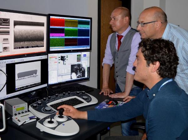 Looking at steel at the atomic level in the imaging suite: l-r Dr Adrian Walters, SPECIFIC: Prof Geraint Williams, College of Engineering; Patrick Dodds, Tata Steel and Swansea University
