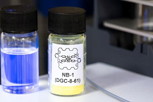 Molecular structure of the OLED molecule with solution glowing blue