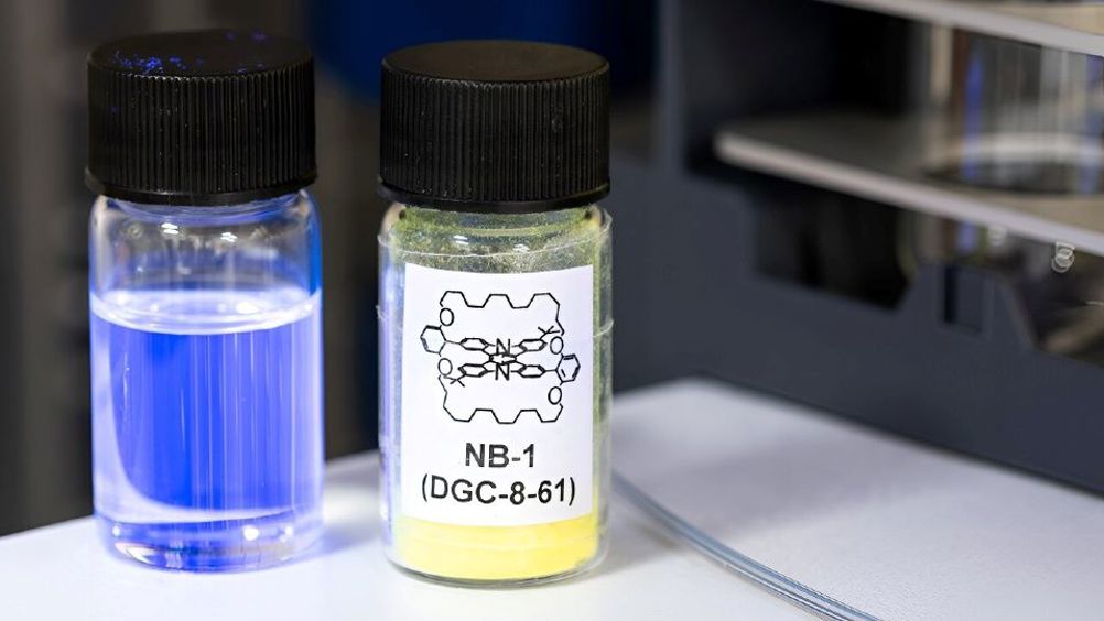 Molecular structure of the OLED molecule with solution glowing blue