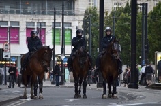 Mounted riot police in Manchester city centre