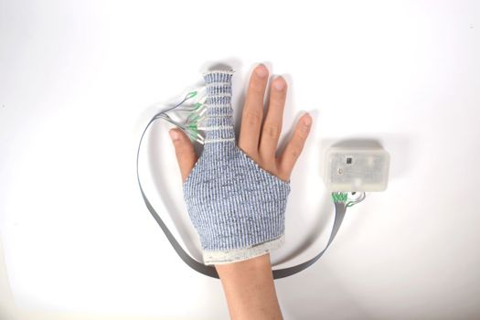 KnitDema is a robotic textile device that allows sequential compression from distal to proximal finger phalanges for mobilising edema