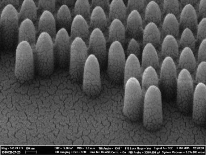 A scanning electron miscroscope photograph shows the pyramid-like nanostructures engraved onto glass: at 200nm they are 100 times smaller than a human hair. Controlling the surface morphology at the nanoscale allows scientists to tailor how the glass interacts with liquids and light with high precision