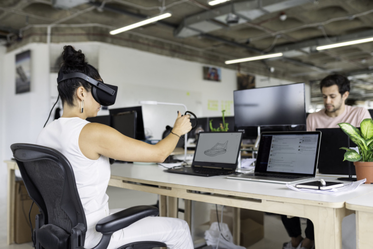 female design engineer with VR