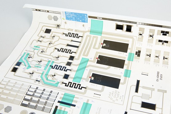 Semiconducting ink containing metal oxides is printed on both sides of paper to form transistors and even microprocessors