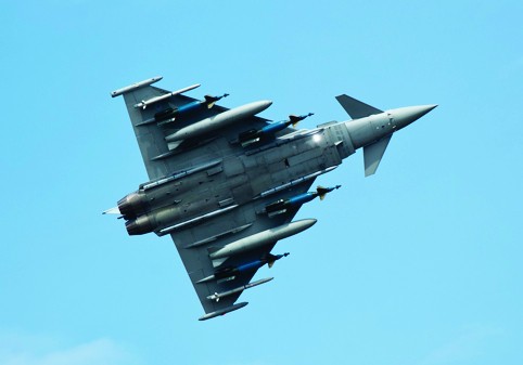 BAE Systems Test pilot Mark Bowman flies Eurofighter Typhoon with a full war load. 4xAMRAAM, 2ASRAAM, 2 1000Litre drop tanks and 4 LGB Bombs at RAF Fairford.