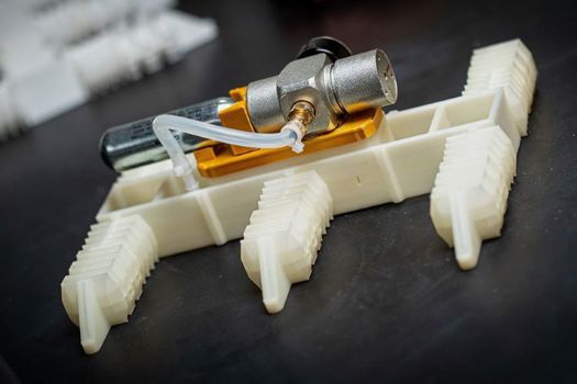 This robot can walk, without electronics, and only with the addition of a cartridge of compressed gas, right off the 3D-printer