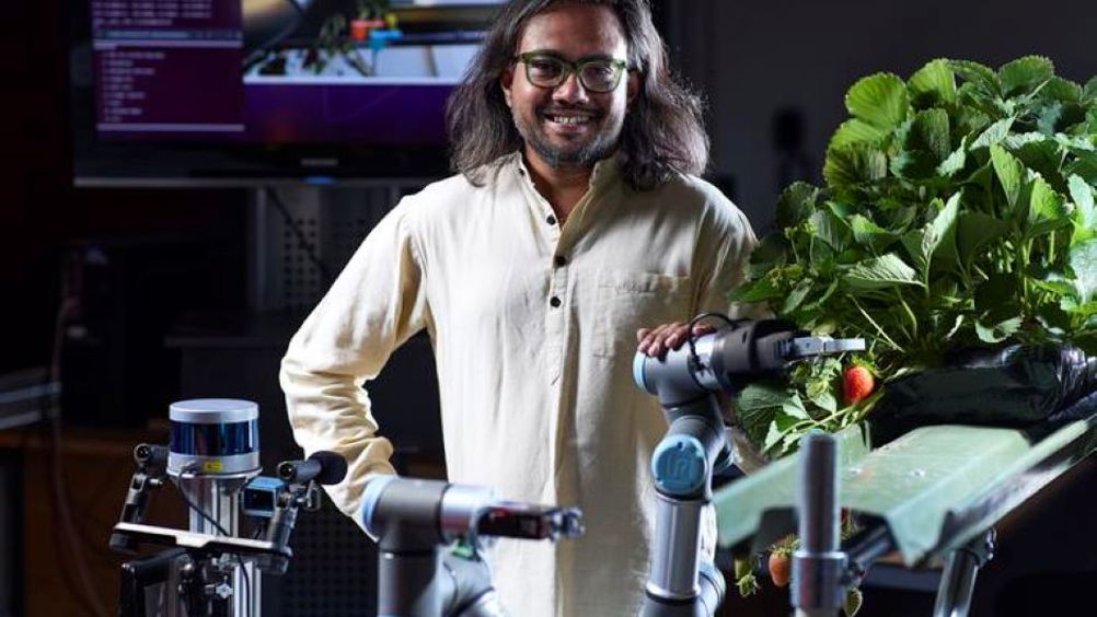 Dr Vishwanathan Mohan with the strawberry-picking robot