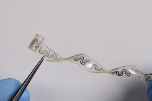 The soft flexible device bends and stretches with the body, without the need for bulky, rigid hardware