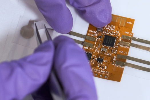The BIND interface (biphasic, nano-dispersed interface) makes assembly of stretchable devices simple while offering excellent mechanical and electrical performance