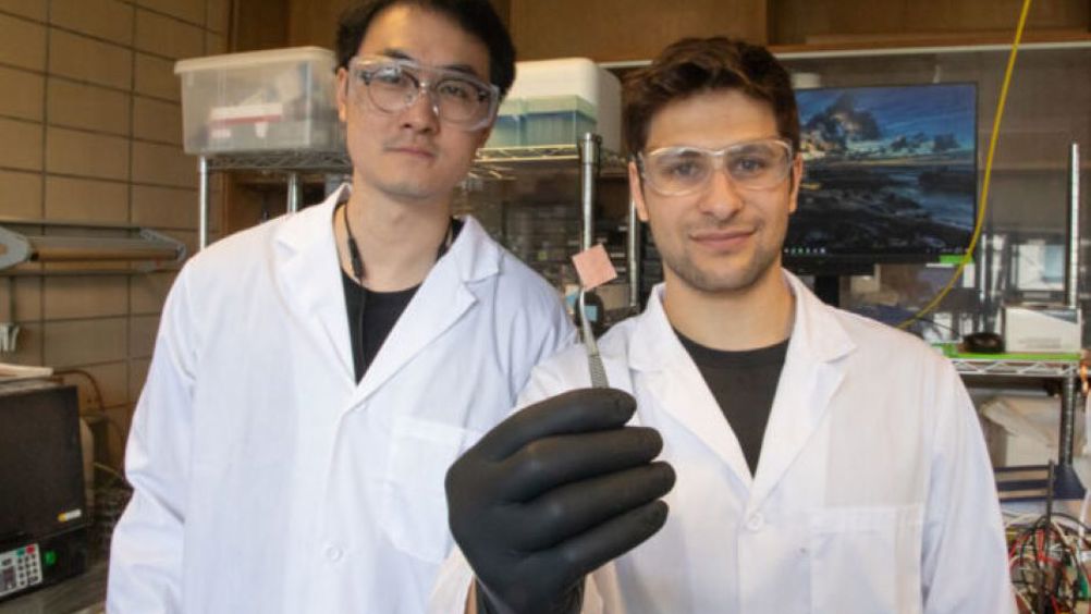 University of Toronto Engineering PhD students Rui Kai (Ray) Miao (left) and Panos Papangelakis (right) hold up a new catalyst they designed to convert captured CO2 gas into valuable products. Their version performs well even in the presence of sulphur dioxide, a contaminant that poisons other catalysts